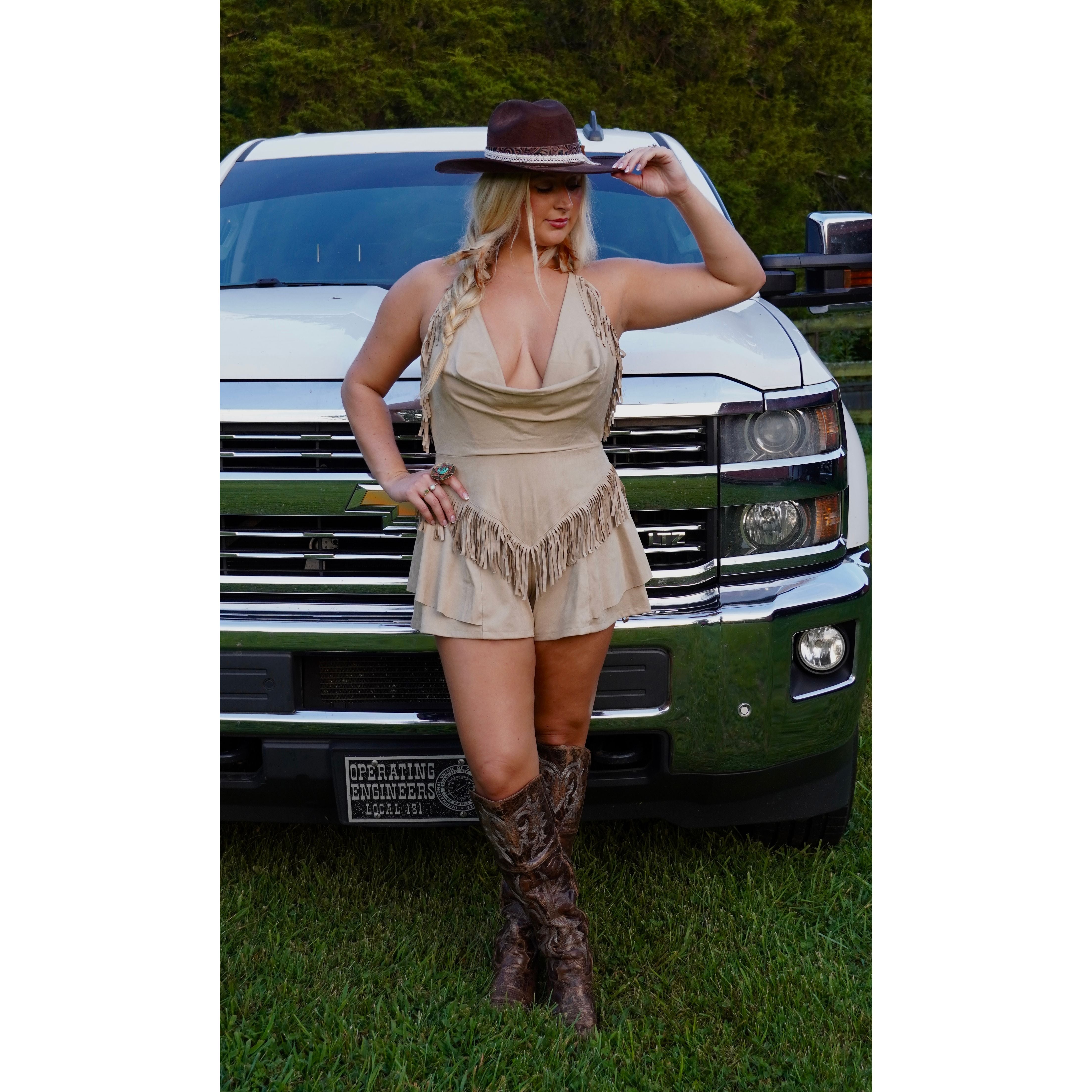 Ruffled suede cowl neck fringe romper
